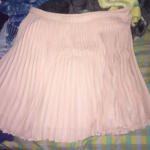 Pleated, knee length skirt